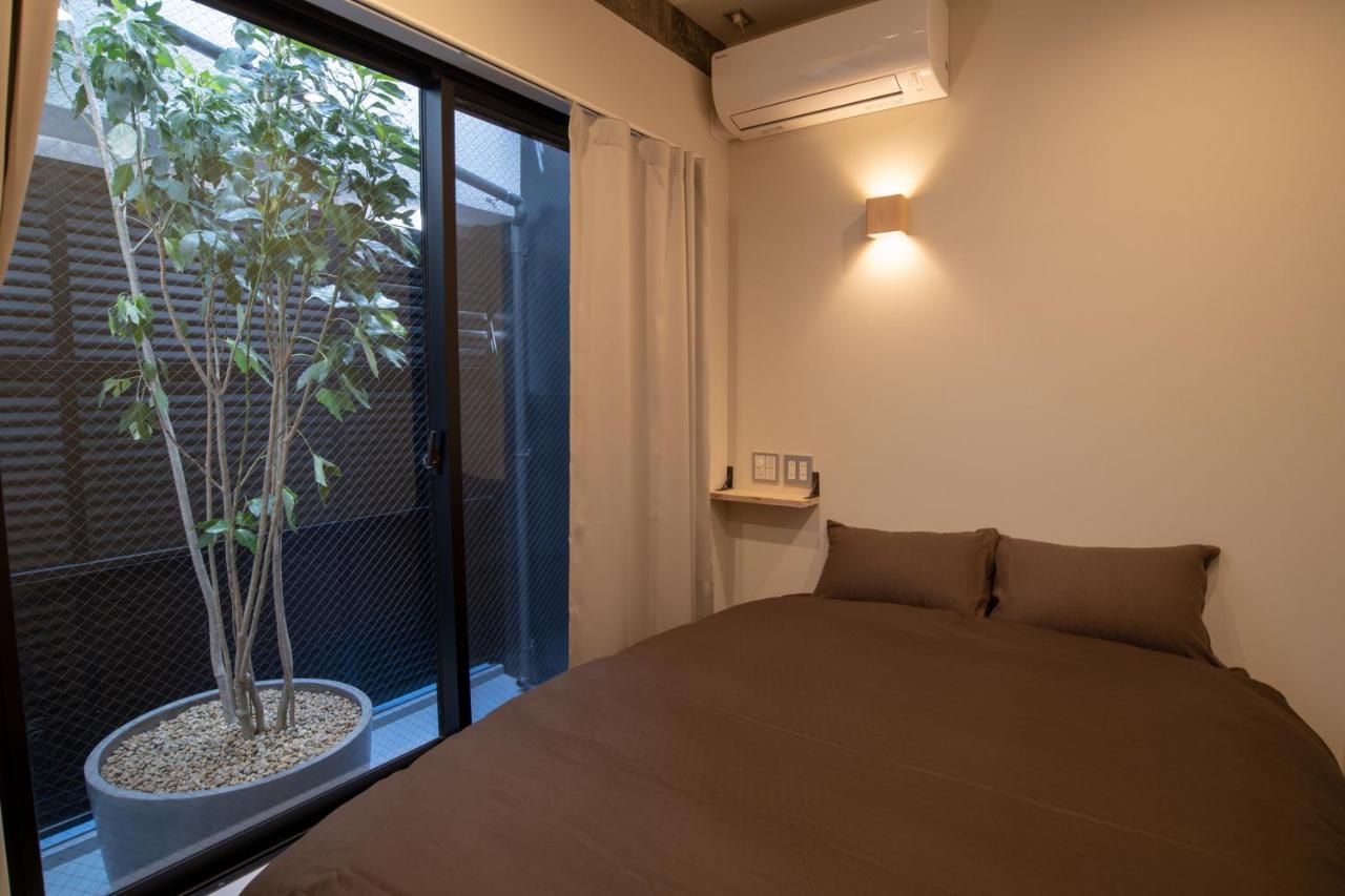 Guesthouse Akicafe Inn Хиросима Экстерьер фото